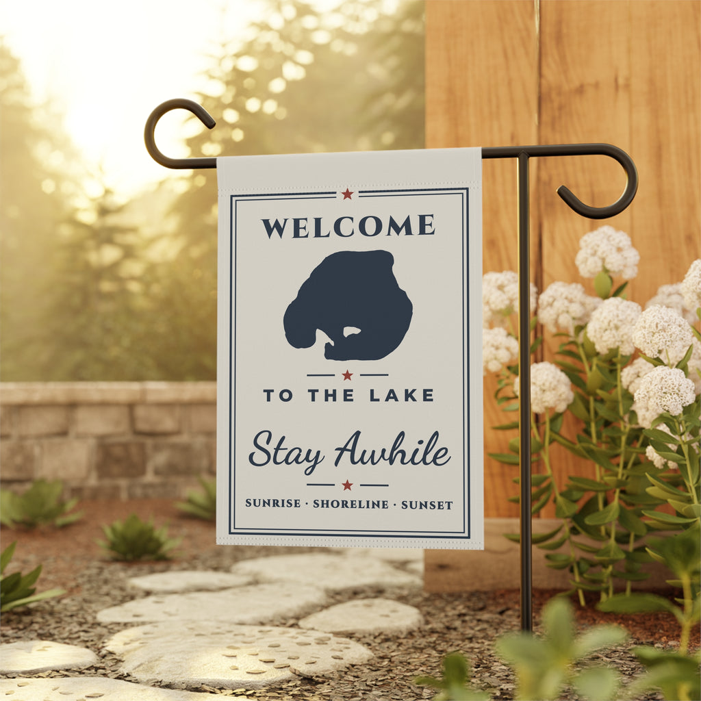 Welcome to the Lake garden flag displayed beside a sunlit garden path; stand not included.