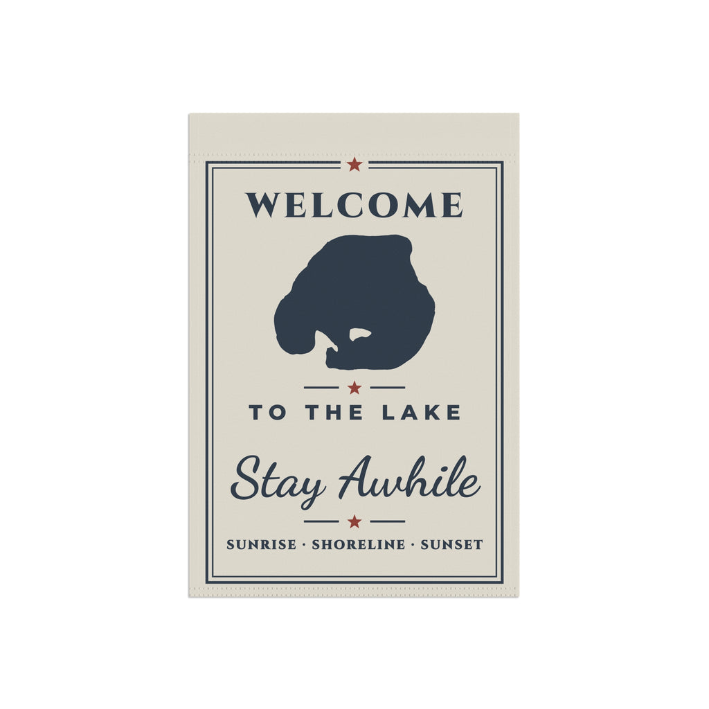 Flat view of the bordered Welcome to the Lake garden flag, featuring a navy lake silhouette.