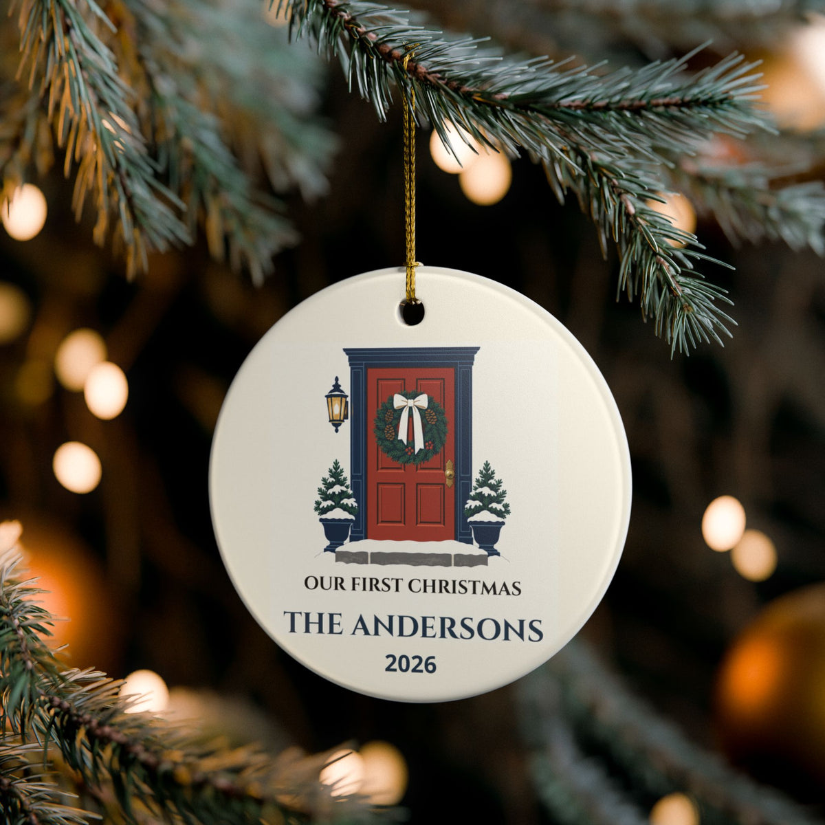 First Christmas in Our New Home ornament hanging on a tree; example personalization shown.