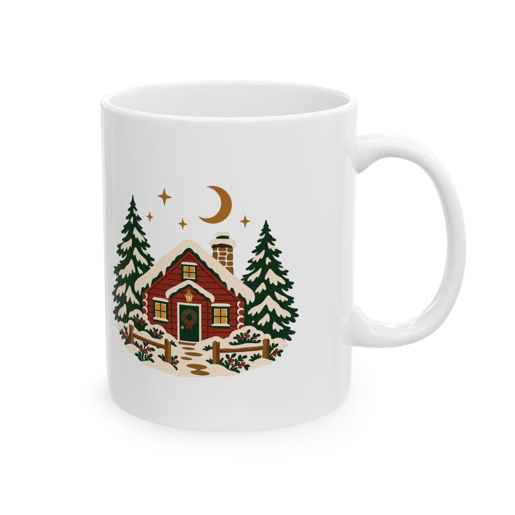 White ceramic mug, handle on the right, showing the Winter Cabin Christmas illustration.